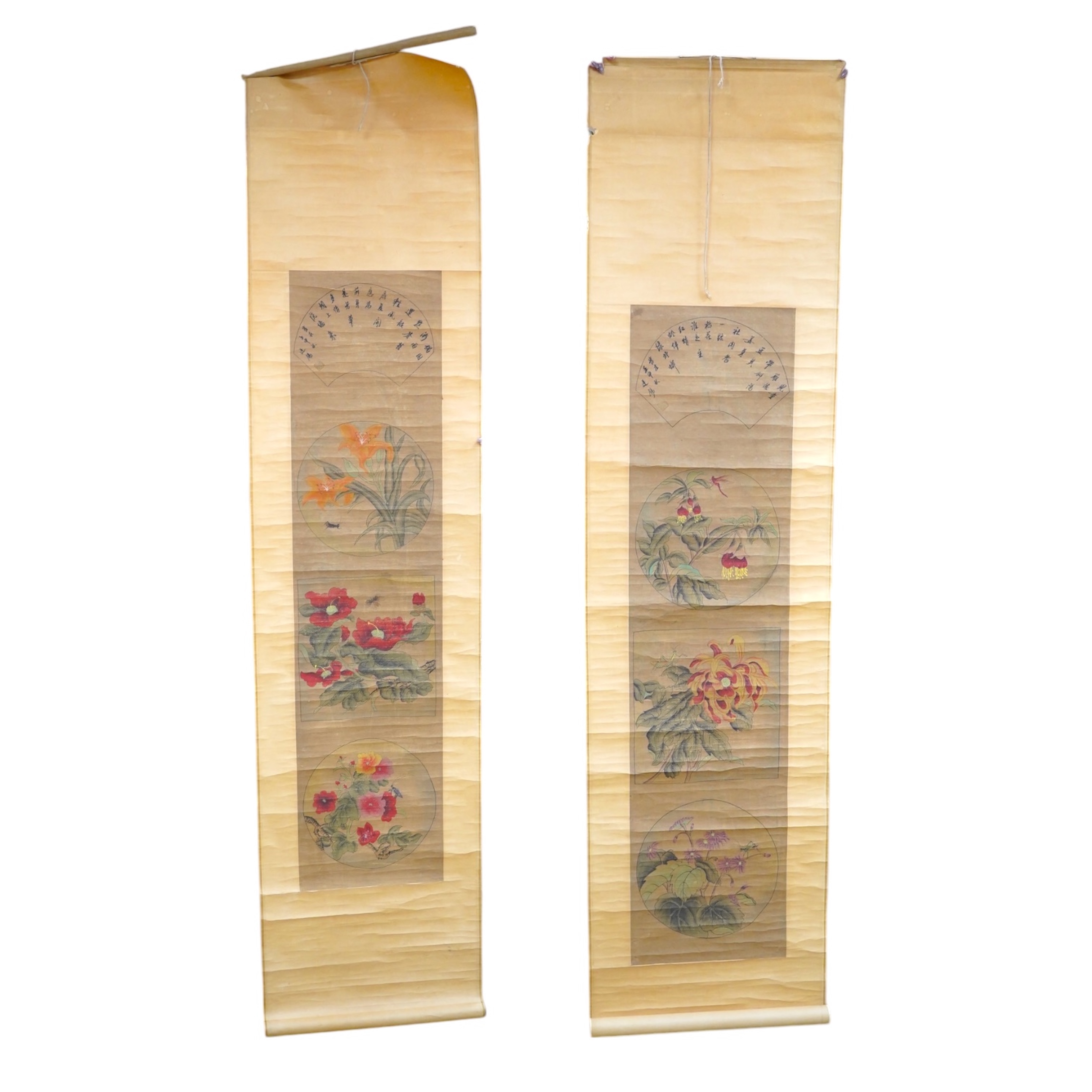 A pair of Chinese scroll pictures. Condition - fair